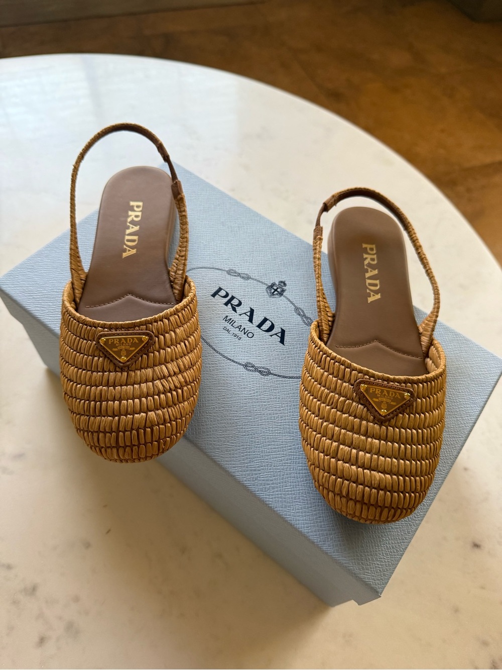 Prada Woven Slingback Mules in caramel with Gold Logo